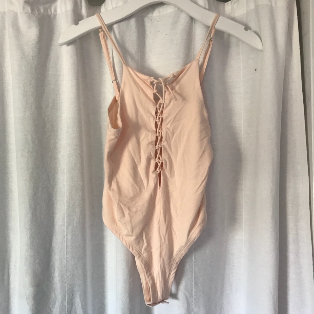 Peachy- nude bodysuit